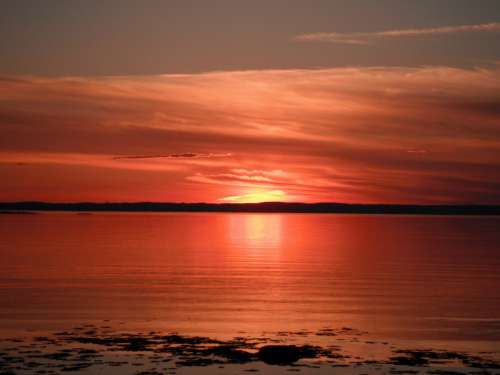 Red Sunset over the Seas in Quebec, Canada free photo