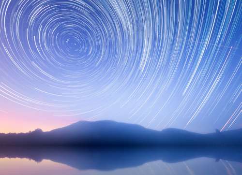Star Trails in the sky over the mountain and mountains free photo