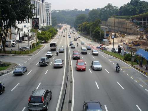 Streets and cars in Kuala Lumpur, Malaysia free photo
