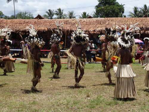 Traditional Dance with native people in New Guinea free photo