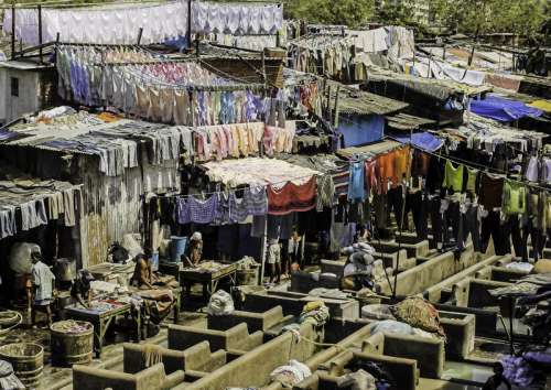 Washing clothes factory in Mumbai, India free photo