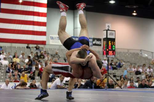 Wrestlers fighting free photo