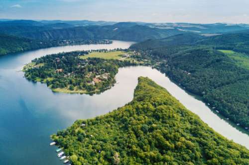 Aerial view. Beautiful landscape with river and forest in summer