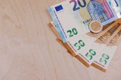 Euro cash on wooden background