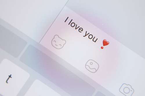 Valentine’s Day, Detail of screen of tablet with a message “I love you”