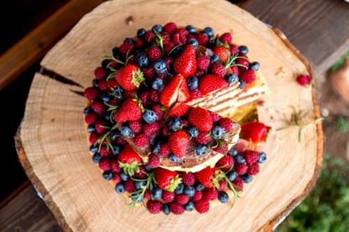 Amazing fruit cake with strawberries, blueberries and raspberries