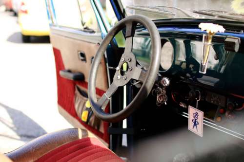 Interior of old car with open door