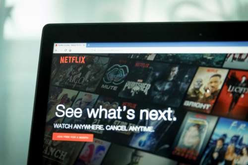 Watch movies!  Netflix app on Laptop screen
