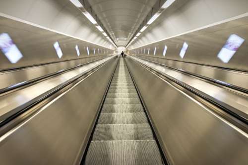 Luxury tunnel with the escalator to the metro station