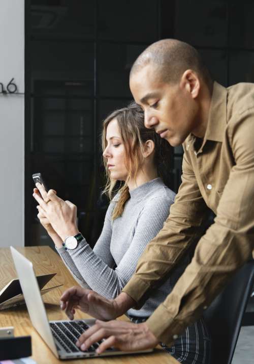 People using digital devices during a break