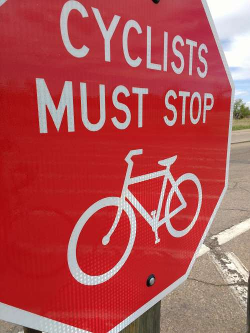 Cyclists Must Stop Sign