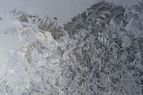 Frost Crystals on Glass Close Up