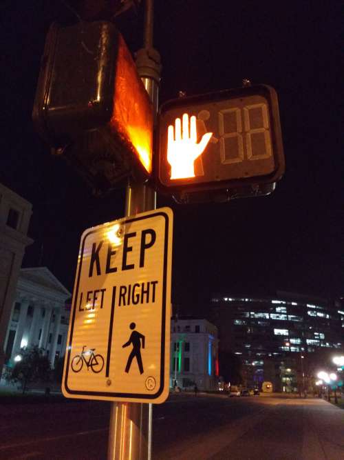 Lighted Pedestrian Cross Signal at Night