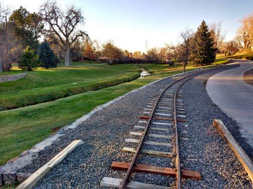 Train Tracks, Stream, and Path through Park