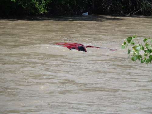 Truck Submerged in River