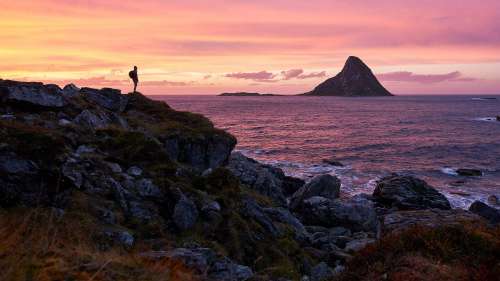 Woman Enjoying the View from the Coast of Northern Norway