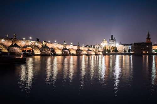 Charles Bridge and Vltava River in Prague at Night