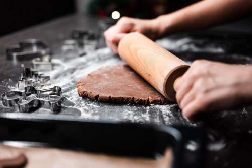 Rolling Homemade Gingerbread Dough for Christmas Biscuits