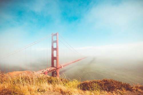 Colorful Golden Gate Bridge in Foggy But Sunny Weather
