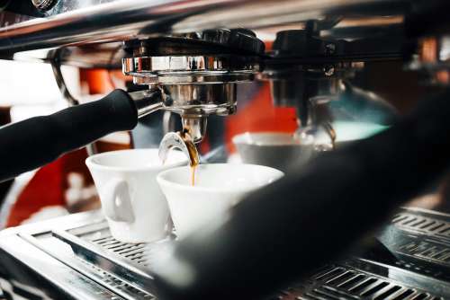 Espresso Machine Making Coffee in Bar