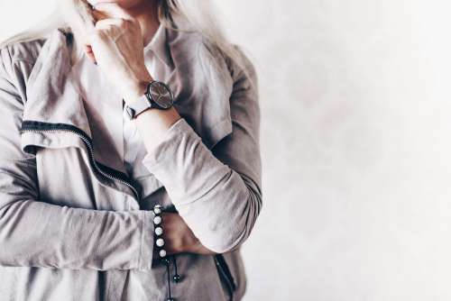 Girl Fashion Pose with Gray Watches and Suede Jacket