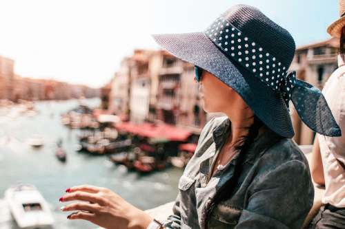 Young Woman on Rialto Bridge in Venice, Italy