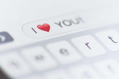 I LOVE YOU Message on Mobile Phone Close Up
