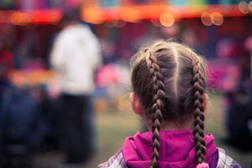 Little Girl in Amusement Park