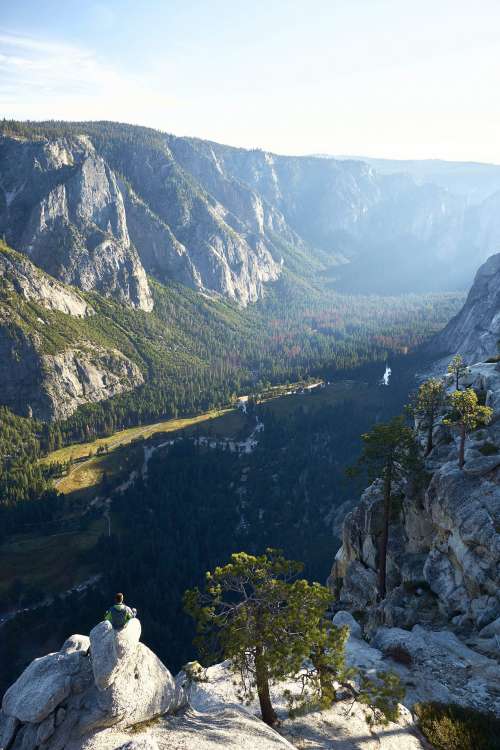 Man Enjoying the View into the Yosemite Valley Vertical