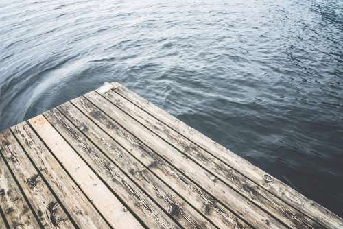 Minimalistic Shot of a Wooden Pier on a Lake