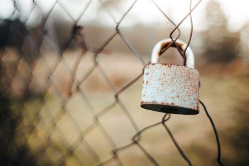 Old Lock on the Fence