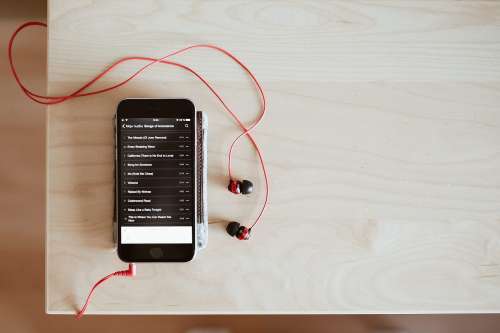 Playing Music with Red Earphones