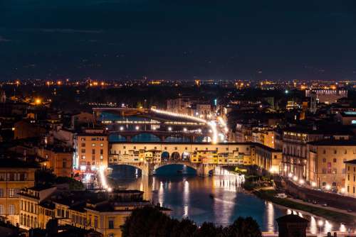 Ponte Vecchio on Arno River at Night
