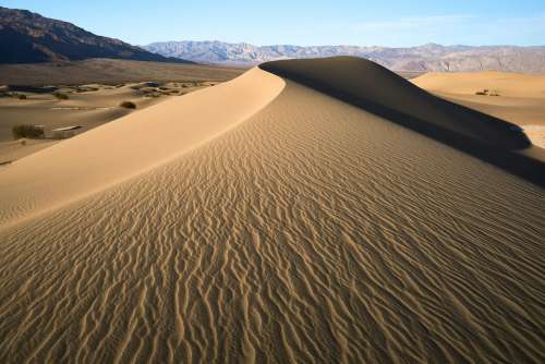 Sand Dunes in Death Valley Desert shaped into S