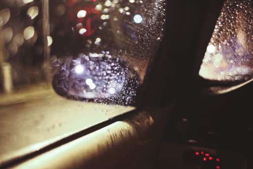 Side View Wing Mirror at Rainy Night