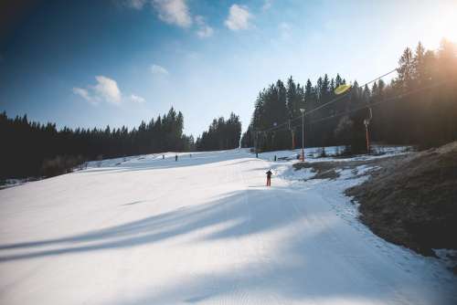 Ski Slope with Sunny Weather