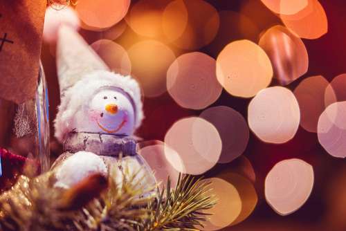 Snowman Decoration with Christmas Bokeh