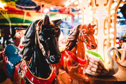 Traditional Carousel Horses on a Fun Fair Ride