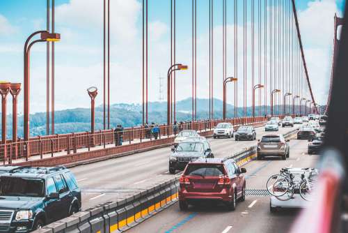 Traffic: a Lot of Cars Driving Across The Golden Gate Bridge