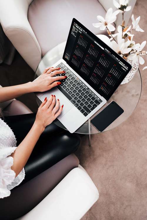 Woman Entrepreneur Working on her Laptop
