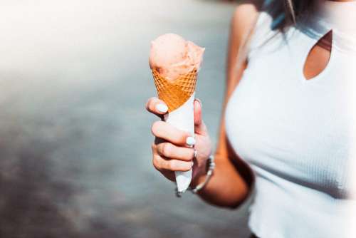 Woman Holding an Ice Cream