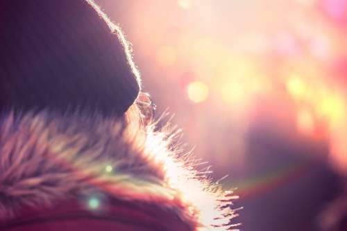 Young Woman in Winter Jacket and Hat