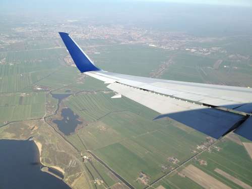 Aircraft Landing Amsterdam Wing