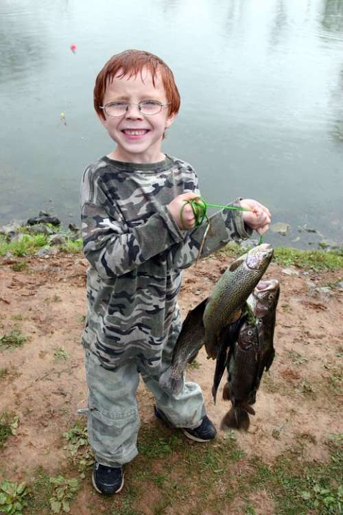 Catch Fish Holding Proudly Fishing Glasses Boy