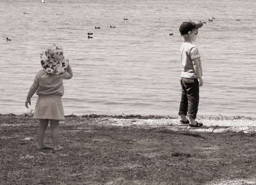 Children Play Beach Black And White Look Water