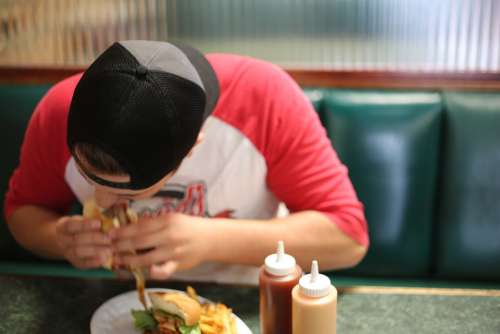 Fast Food Man Eating Male Indoors Booth Unhealthy