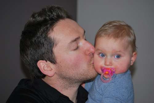 Father With Child Baby Kiss Love