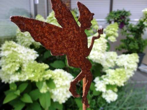 Fee Flower Plug Rust Rusty Figure Metal