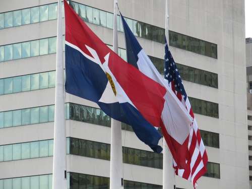 Flags Waving Dallas City Hall American Flag