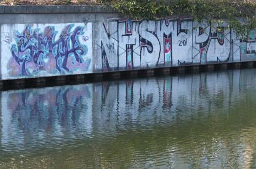 Graffiti Water Mirroring Wall Berlin